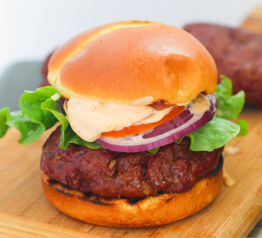 Homemade Burger sauce topping a grilled burger for a delicious experience